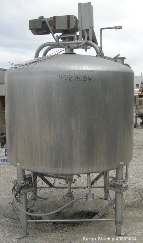 Used Creamery Package Tank, 500 Gallon, 304 stainless steel, vertical. 60" diameter x 39" straight side. Dished top, coned bottom. Fixed stainless steel agitator bridge, bottom supported anchor agita...