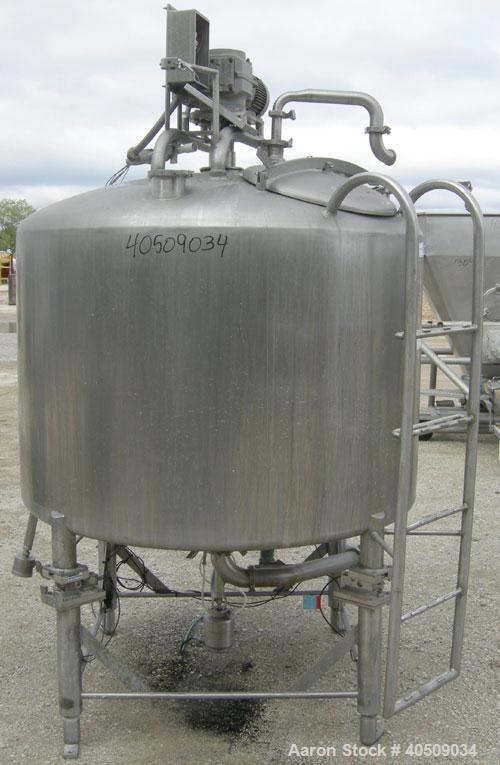Used Creamery Package Tank, 500 Gallon, 304 stainless steel, vertical. 60" diameter x 39" straight side. Dished top, coned bottom. Fixed stainless steel agitator bridge, bottom supported anchor agita...