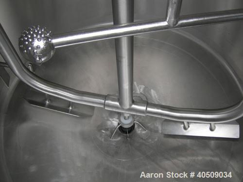 Used Creamery Package Tank, 500 Gallon, 304 stainless steel, vertical. 60" diameter x 39" straight side. Dished top, coned bottom. Fixed stainless steel agitator bridge, bottom supported anchor agita...