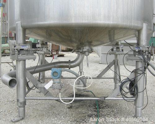 Used Creamery Package Tank, 500 Gallon, 304 stainless steel, vertical. 60" diameter x 39" straight side. Dished top, coned bottom. Fixed stainless steel agitator bridge, bottom supported anchor agita...