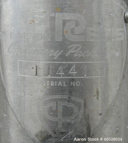 Used Creamery Package Tank, 500 Gallon, 304 stainless steel, vertical. 60" diameter x 39" straight side. Dished top, coned bottom. Fixed stainless steel agitator bridge, bottom supported anchor agita...