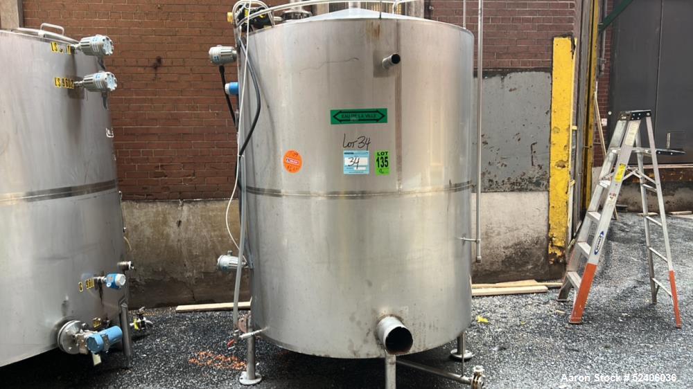 Used Industries D'Acler Tank, Approximate 3400 Liter (898 Gallon), 304 Stainless Steel, Vertical. Approximate 60" diameter x 72" straight side, coned top & bottom. Mounted on 4 stainless legs. Serial...