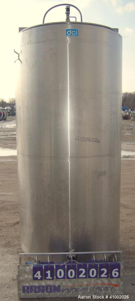 Used DCI Jacketed Tank, 750 Gallon, 304 Stainless Steel, Vertical. Flat top with 1/2 hinged cover, sloped bottom. Bottom head and 1/3 bottom sidewall dimple jacketed, rated 90 psi at 200 deg F. 2" tr...