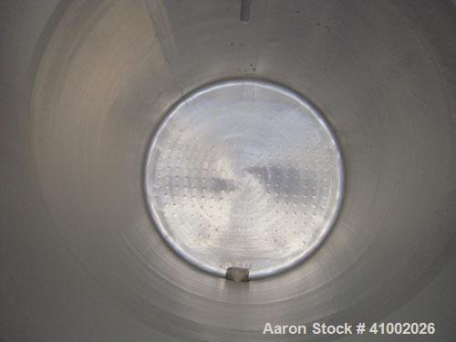 Used DCI Jacketed Tank, 750 Gallon, 304 Stainless Steel, Vertical. Flat top with 1/2 hinged cover, sloped bottom. Bottom head and 1/3 bottom sidewall dimple jacketed, rated 90 psi at 200 deg F. 2" tr...
