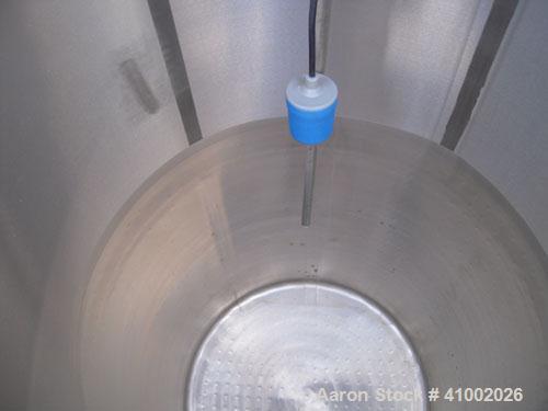 Used DCI Jacketed Tank, 750 Gallon, 304 Stainless Steel, Vertical. Flat top with 1/2 hinged cover, sloped bottom. Bottom head and 1/3 bottom sidewall dimple jacketed, rated 90 psi at 200 deg F. 2" tr...