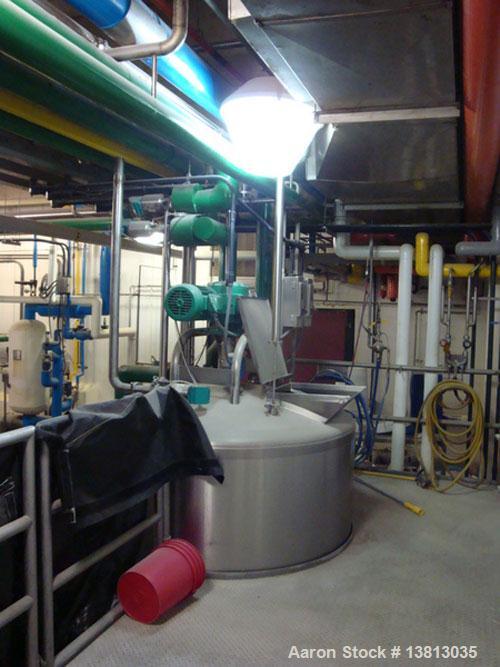 Used DCI 750 Gallon stainless steel, hot water jacketed, process tank with dual agitation, Lightnin style mixer and additional product whip.Dims- 79" Diam Overall Dims- 7' L X 7' W X 10' Tall. Lighti...