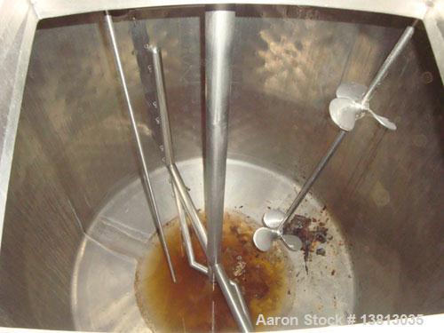 Used DCI 750 Gallon stainless steel, hot water jacketed, process tank with dual agitation, Lightnin style mixer and additional product whip.Dims- 79" Diam Overall Dims- 7' L X 7' W X 10' Tall. Lighti...
