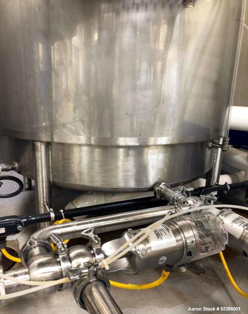 Used DCI Jacketed Mix Tank, Approximate 750 Gallon, 316 Stainless Steel, Vertical. Approximate 53.75" diameter x 81" deep. Flat top with 1/2 hinged cover, sloped bottom. 304 Stainless steel dimple ja...