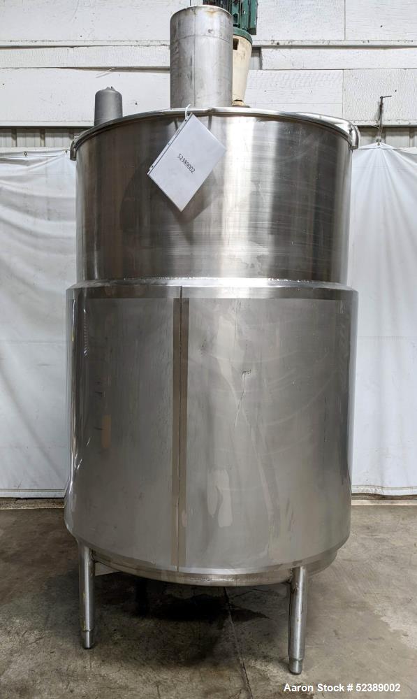 Used DCI Jacketed Mix Tank, Approximate 750 Gallon, 316 Stainless Steel, Vertical. Approximate 53.75" diameter x 81" deep. Flat top with 1/2 hinged cover, sloped bottom. 304 Stainless steel dimple ja...