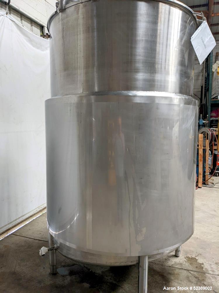 Used DCI Jacketed Mix Tank, Approximate 750 Gallon, 316 Stainless Steel, Vertical. Approximate 53.75" diameter x 81" deep. Flat top with 1/2 hinged cover, sloped bottom. 304 Stainless steel dimple ja...