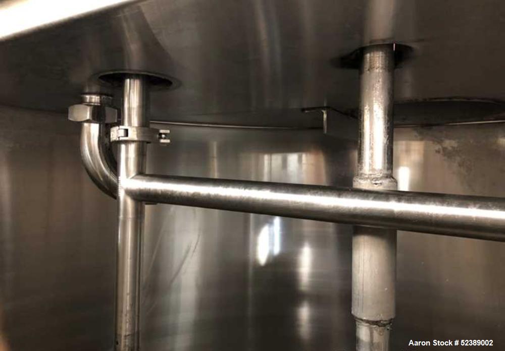 Used DCI Jacketed Mix Tank, Approximate 750 Gallon, 316 Stainless Steel, Vertical. Approximate 53.75" diameter x 81" deep. Flat top with 1/2 hinged cover, sloped bottom. 304 Stainless steel dimple ja...
