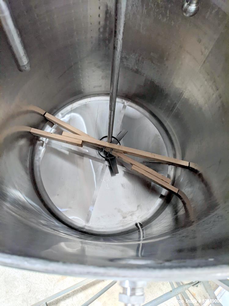 Used DCI Jacketed Mix Tank, Approximate 750 Gallon, 316 Stainless Steel, Vertical. Approximate 53.75" diameter x 81" deep. Flat top with 1/2 hinged cover, sloped bottom. 304 Stainless steel dimple ja...