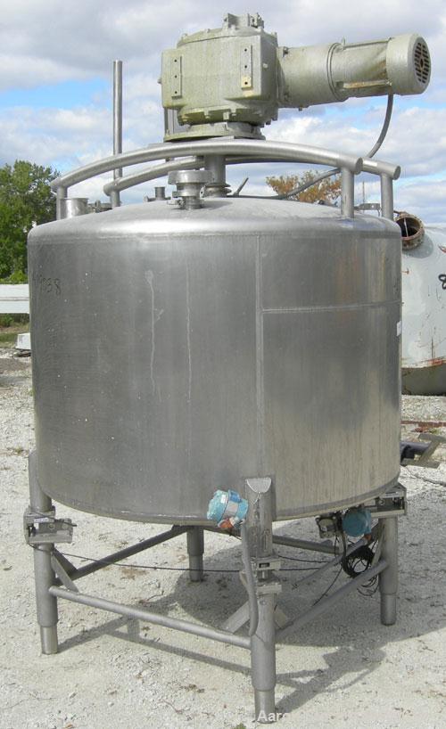 Used Dairy Craft Tank, 500 Gallon, 304 stainless steel, vertical. 60" diameter x 38" straight side. Dished top, coned bottom. Fixed stainless steel agitator bridge, bottom supported anchor style agit...