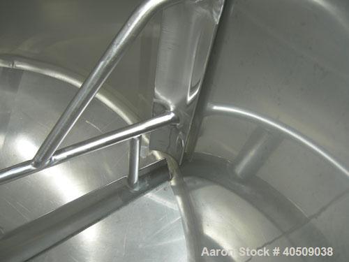 Used Dairy Craft Tank, 500 Gallon, 304 stainless steel, vertical. 60" diameter x 38" straight side. Dished top, coned bottom. Fixed stainless steel agitator bridge, bottom supported anchor style agit...