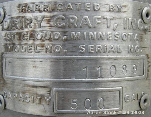 Used Dairy Craft Tank, 500 Gallon, 304 stainless steel, vertical. 60" diameter x 38" straight side. Dished top, coned bottom. Fixed stainless steel agitator bridge, bottom supported anchor style agit...