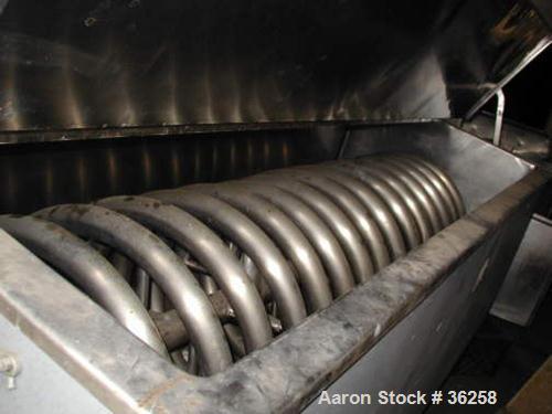 Used Delaval Coil Vat Batch Processor, 660 Gallon, 4300 Pound Capacity. 40" Wide x 106" long x approximately 36" deep. Coil agitator, 15 turns of 2" diameter pipe for heating or cooling. Insulated pa...