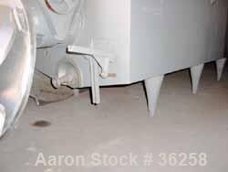 Used Delaval Coil Vat Batch Processor, 660 Gallon, 4300 Pound Capacity. 40" Wide x 106" long x approximately 36" deep. Coil agitator, 15 turns of 2" diameter pipe for heating or cooling. Insulated pa...