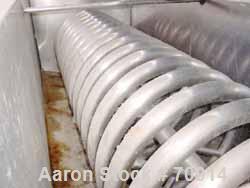 Used Delaval coil vat batch processor, 770 gallon, 4300 pound capacity. 42" wide x 106" long x approximately 40" deep. Coil agitator, 17 turns of 2" diameter pipe for heating or cooling. Insulated pa...
