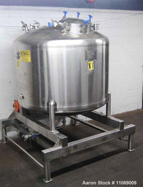 Used Feldmeier 2,500 Liter Pressure Tank.  19" Diameter manhole and 9 additional 2-1/2" top inlet ports, 2-1/2" diameter discharge, 72" diameter x 50" high.  Overall dimensions 75" x 75" x 106".  Ves...