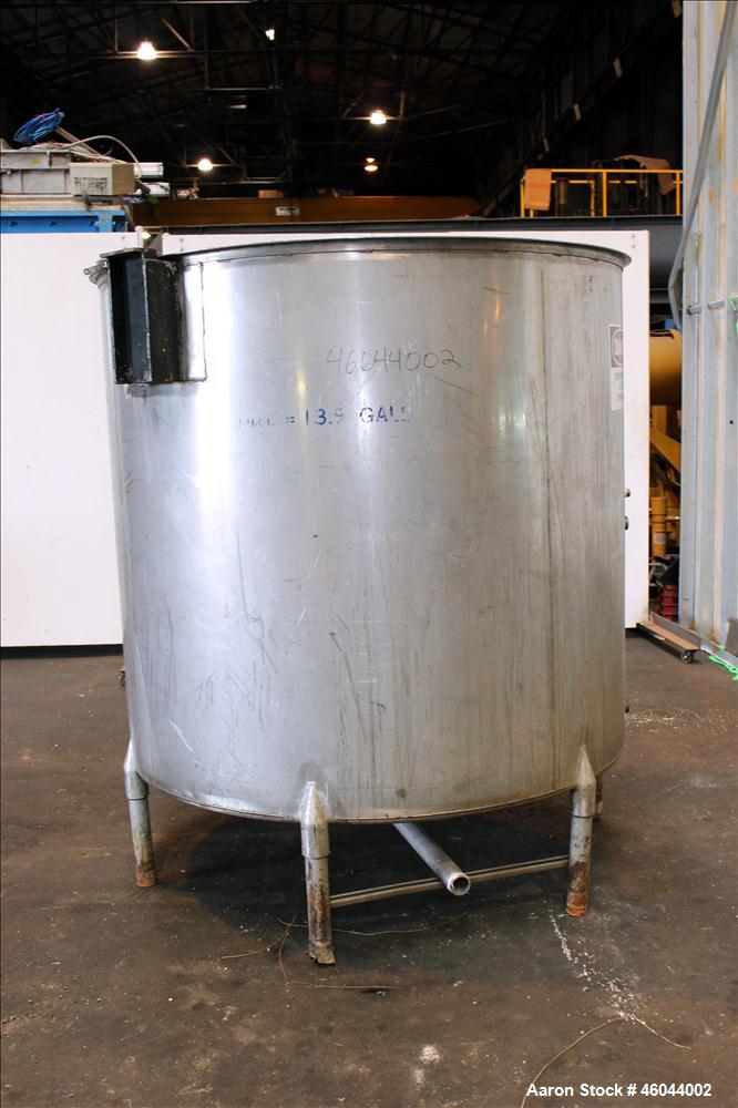 Used Filpaco Product Tank, 800 Gallon, 304 Stainless Steel, Vertical. 64" Diameter x 60" straight side. Flat top with no cover, coned bottom. 2" Internal pipe heating coil, approximately 24" tall. 2"...