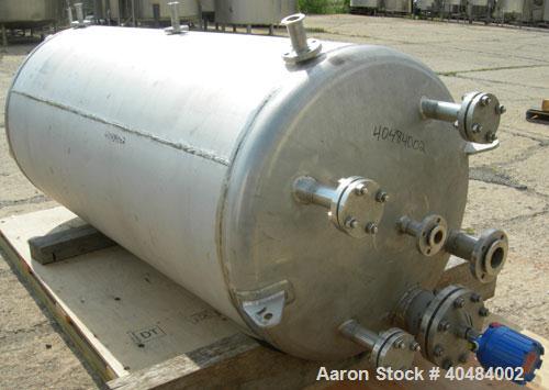 Used Four Corp pressure tank, 525 gallon, 316 stainless steel, vertical. 42" diameter x 86" straight side, dished top and bottom. Internal rated 40/-15 psi at 400 deg F. Openings: top 1 1/2", (3) 2",...