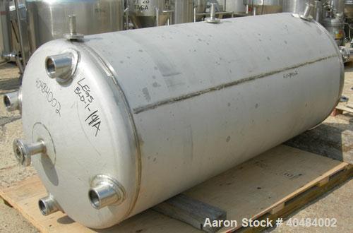 Used Four Corp pressure tank, 525 gallon, 316 stainless steel, vertical. 42" diameter x 86" straight side, dished top and bottom. Internal rated 40/-15 psi at 400 deg F. Openings: top 1 1/2", (3) 2",...