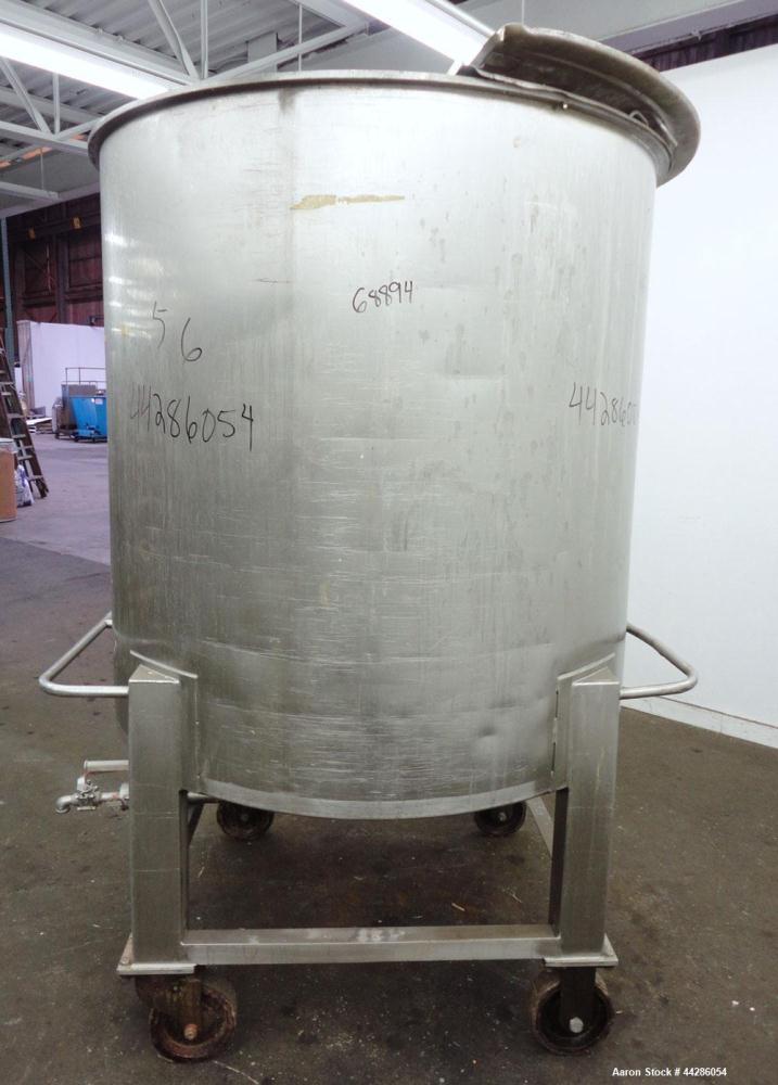 Used Groen Tank, 500 Gallon, Model SP, 304 Stainless Steel, Vertical. Approximate 54” diameter x 55” straight side. Open top with ½ hinged cover, dished bottom. 2” Center bottom outlet. Mounted on 4 ...