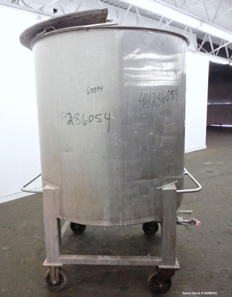 Used Groen Tank, 500 Gallon, Model SP, 304 Stainless Steel, Vertical. Approximate 54” diameter x 55” straight side. Open top with ½ hinged cover, dished bottom. 2” Center bottom outlet. Mounted on 4 ...