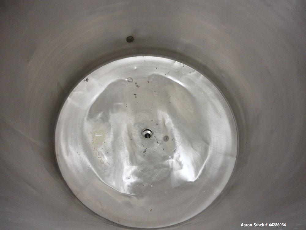 Used Groen Tank, 500 Gallon, Model SP, 304 Stainless Steel, Vertical. Approximate 54” diameter x 55” straight side. Open top with ½ hinged cover, dished bottom. 2” Center bottom outlet. Mounted on 4 ...