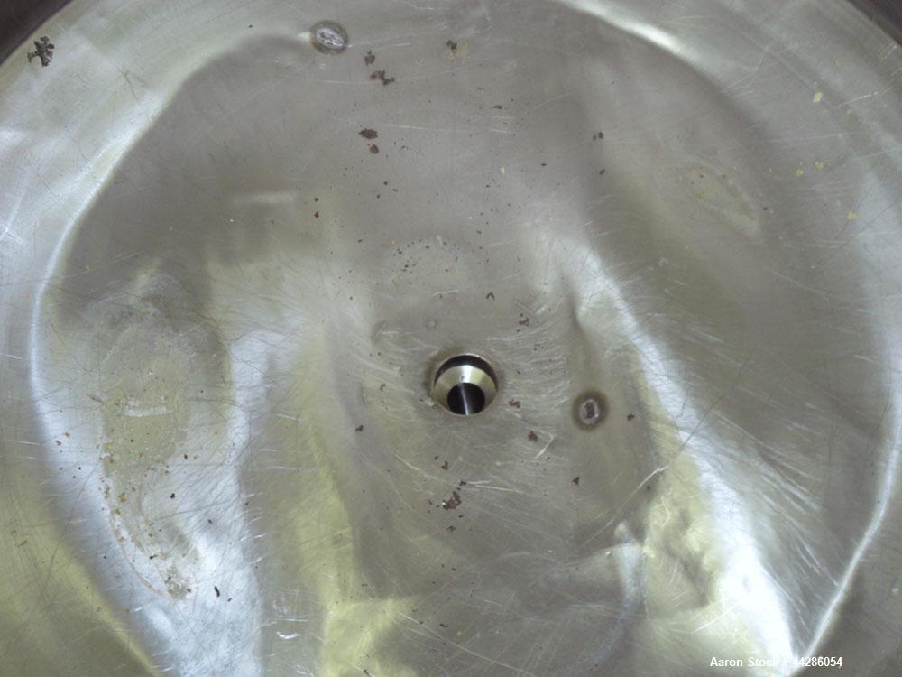 Used Groen Tank, 500 Gallon, Model SP, 304 Stainless Steel, Vertical. Approximate 54” diameter x 55” straight side. Open top with ½ hinged cover, dished bottom. 2” Center bottom outlet. Mounted on 4 ...