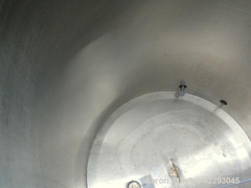 Used Hartel Tank, 500 Gallon, 304 Stainless Steel, Vertical. 48" Diameter x 66" straight side. Flat top and bottom. Openings: top (3) 1-1/2" tri-clamp, 2" tri-clamp, (3) 3" tri-clamp, 16" manway with...