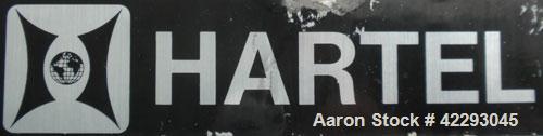 Used Hartel Tank, 500 Gallon, 304 Stainless Steel, Vertical. 48" Diameter x 66" straight side. Flat top and bottom. Openings: top (3) 1-1/2" tri-clamp, 2" tri-clamp, (3) 3" tri-clamp, 16" manway with...