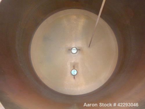 Used Hartel Tank, 500 Gallon, 304 Stainless Steel, Vertical. 48" Diameter x 66" straight side. Flat top and bottom. Openings: top 1-1/2" tri-clamp, 2" tri-clamp, (3) 3" tri-clamp, 16" manway with cov...