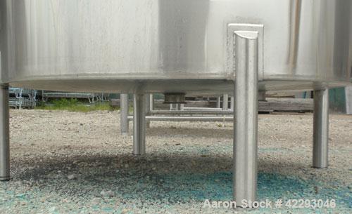 Used Hartel Tank, 500 Gallon, 304 Stainless Steel, Vertical. 48" Diameter x 66" straight side. Flat top and bottom. Openings: top 1-1/2" tri-clamp, 2" tri-clamp, (3) 3" tri-clamp, 16" manway with cov...
