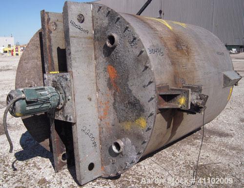 Used Imperial Steel Tank Company Tank, 950 gallon, 304 stainless steel, vertical. 60" diameter x 72" straight side. Flat bolt on top with a 1/4 hinged cover, dish bottom. Top carbon steel agitator br...