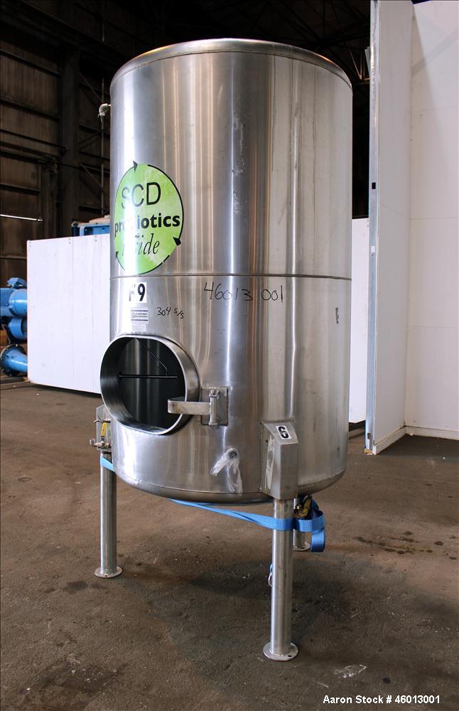 Used JV Northwest Inc. Tank, 600 Gallon, 304 Stainless steel, Vertical. Approximate 48" diameter x 72" straight side. Dished heads. Spray ball. Openings 22" X 16" man way with cover, top (2) 3/4" tri...