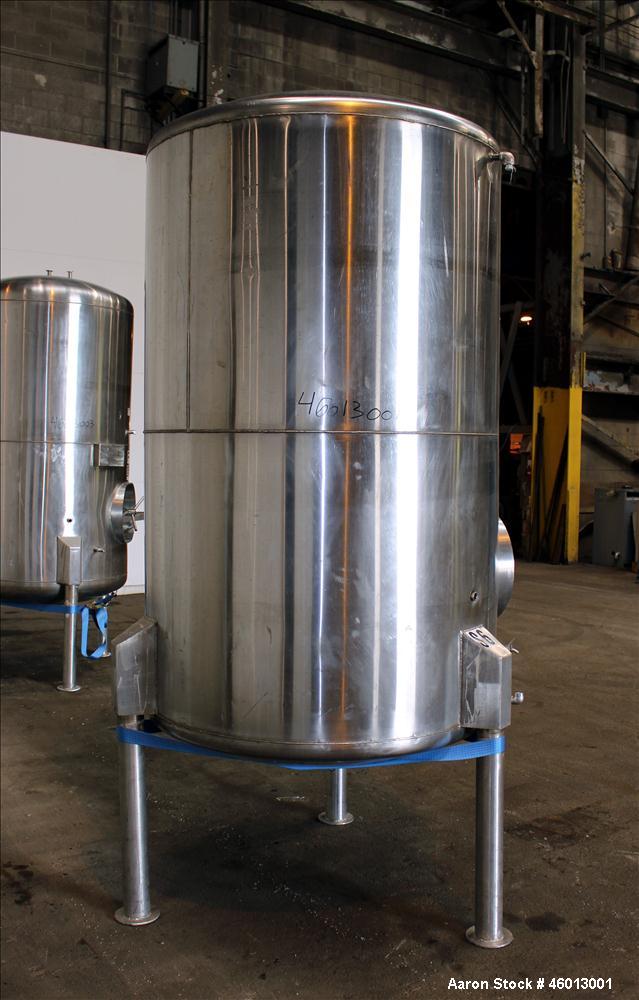 Used JV Northwest Inc. Tank, 600 Gallon, 304 Stainless steel, Vertical. Approximate 48" diameter x 72" straight side. Dished heads. Spray ball. Openings 22" X 16" man way with cover, top (2) 3/4" tri...