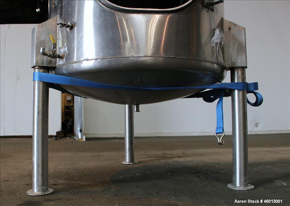 Used JV Northwest Inc. Tank, 600 Gallon, 304 Stainless steel, Vertical. Approximate 48" diameter x 72" straight side. Dished heads. Spray ball. Openings 22" X 16" man way with cover, top (2) 3/4" tri...