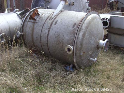 Used Modern Welding Pressure Tank, 500 Gallon, 316 Stainless Steel, Vertical. 48" diameter x 63" straight side, dish top and bottom. Internal rated 35 psi at 600 deg F. (4) 5" wide x 1/4" thick botto...