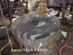 Used Modern Welding Pressure Tank, 500 Gallon, 316 Stainless Steel, Vertical. 48" diameter x 63" straight side, dish top and bottom. Internal rated 35 psi at 600 deg F. (4) 5" wide x 1/4" thick botto...