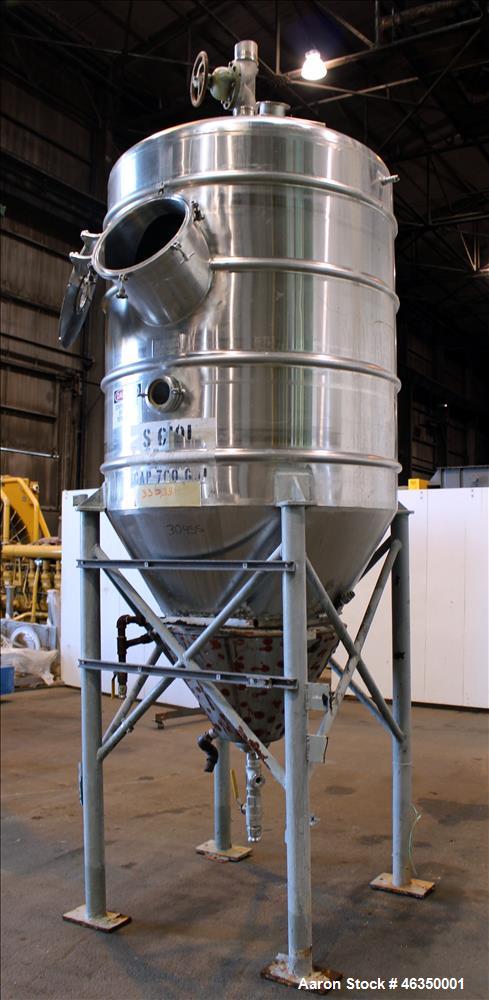 Used Mojonnier Brothers Tank, Size 443, Approximately 700 Gallons, 304 Stainless Steel, Vertical. Approximately 54" diameter x 61" straight side. Dish top, partially jacketed 42" cone bottom, no rati...