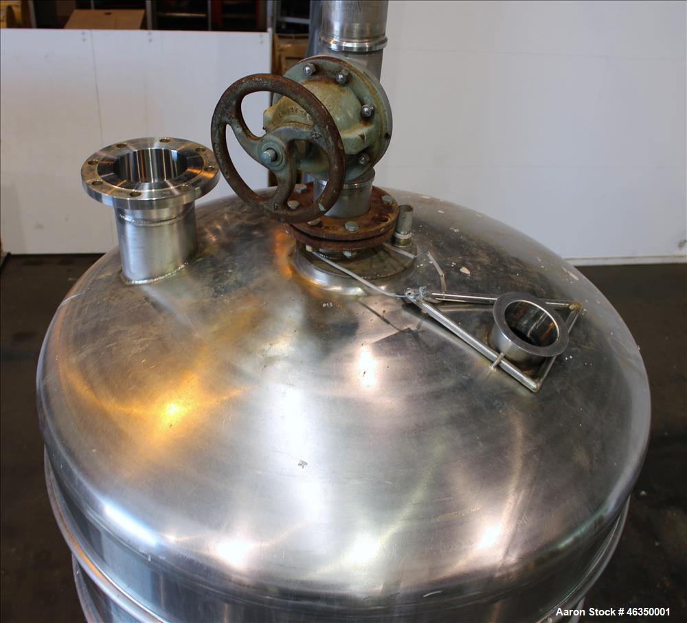 Used Mojonnier Brothers Tank, Size 443, Approximately 700 Gallons, 304 Stainless Steel, Vertical. Approximately 54" diameter x 61" straight side. Dish top, partially jacketed 42" cone bottom, no rati...