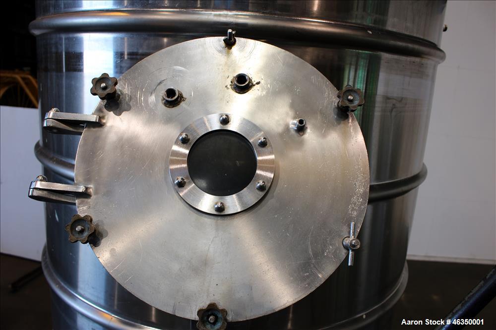 Used Mojonnier Brothers Tank, Size 443, Approximately 700 Gallons, 304 Stainless Steel, Vertical. Approximately 54" diameter x 61" straight side. Dish top, partially jacketed 42" cone bottom, no rati...