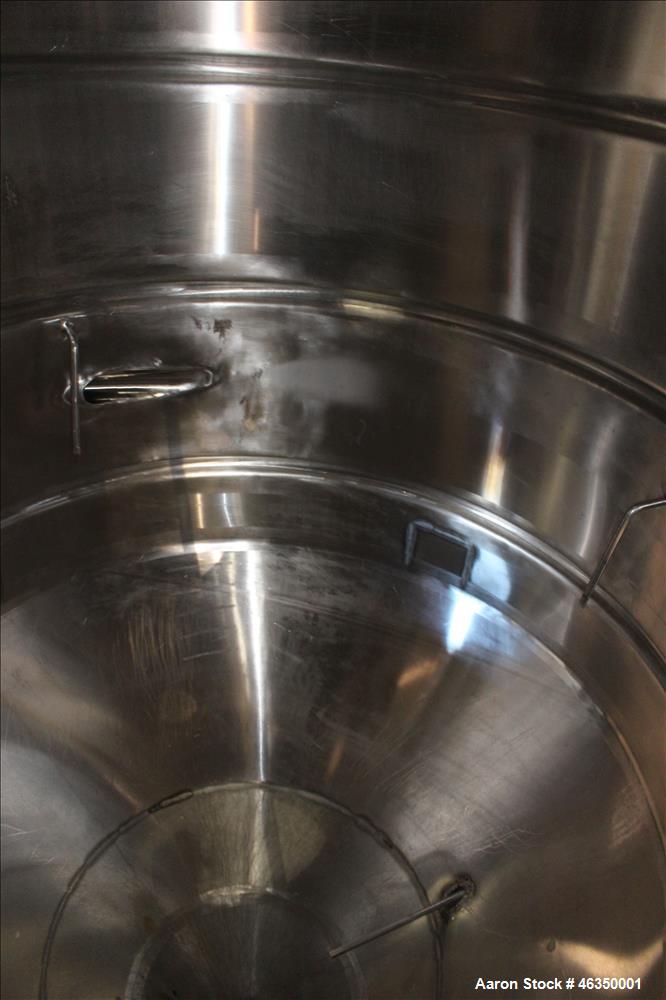Used Mojonnier Brothers Tank, Size 443, Approximately 700 Gallons, 304 Stainless Steel, Vertical. Approximately 54" diameter x 61" straight side. Dish top, partially jacketed 42" cone bottom, no rati...