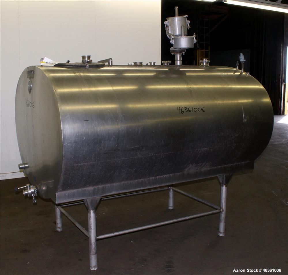 Used Mueller Cooling Tank, 500 Gallons, 304 Stainless Steel, Horizontal. Approximately 56" wide x 40" tall oval x 76" straight side. Flat side heads. Insulated with stainless steel sheathing. Opening...