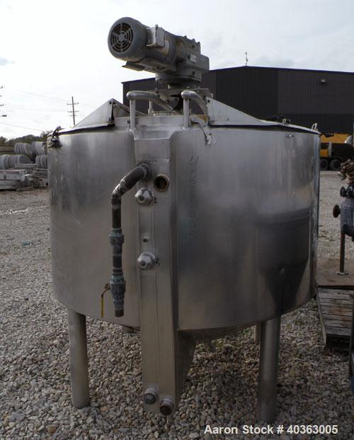 Used Tank, 550 Gallon, 316 Stainless Steel, Vertical. Approximately 66" diameter x 36" straight side x 36" coned bottom. Flat top with (2) 1/3 covers. Stainless steel agitator bridge, anchor style bl...