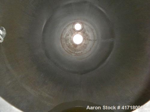 Used Tank, Approximately 1000 Gallon, 304 stainless steel. 78" diameter x 36" straight side, domed bolt on top cover, hemi bottom 72" overall depth. (2) Internal spray balls. Openings: top 10" drive,...