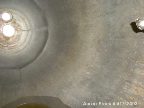 Used Tank, Approximately 1000 Gallon, 304 stainless steel. 78" diameter x 36" straight side, domed bolt on top cover, hemi bottom 72" overall depth. (2) Internal spray balls. Openings: top 10" drive,...