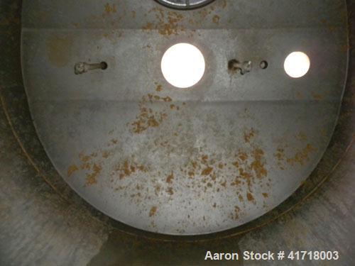 Used Tank, Approximately 1000 Gallon, 304 stainless steel. 78" diameter x 36" straight side, domed bolt on top cover, hemi bottom 72" overall depth. (2) Internal spray balls. Openings: top 10" drive,...