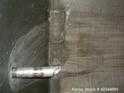 Used Tank, 750 Gallon, 304 Stainless Steel, Vertical. 56" Diameter x 70" straight side, dished 316 stainless steel top, coned bottom. Off center top entering Lightnin agitator, model N33G-150, 1-1/2"...
